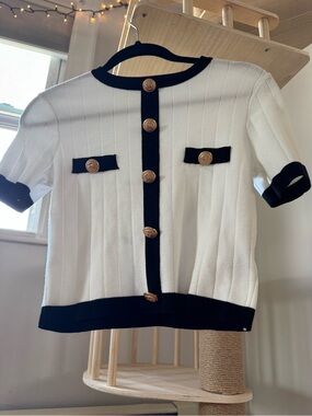 White Knit Short Sleeve Sweater with Black Trim and Gold Buttons